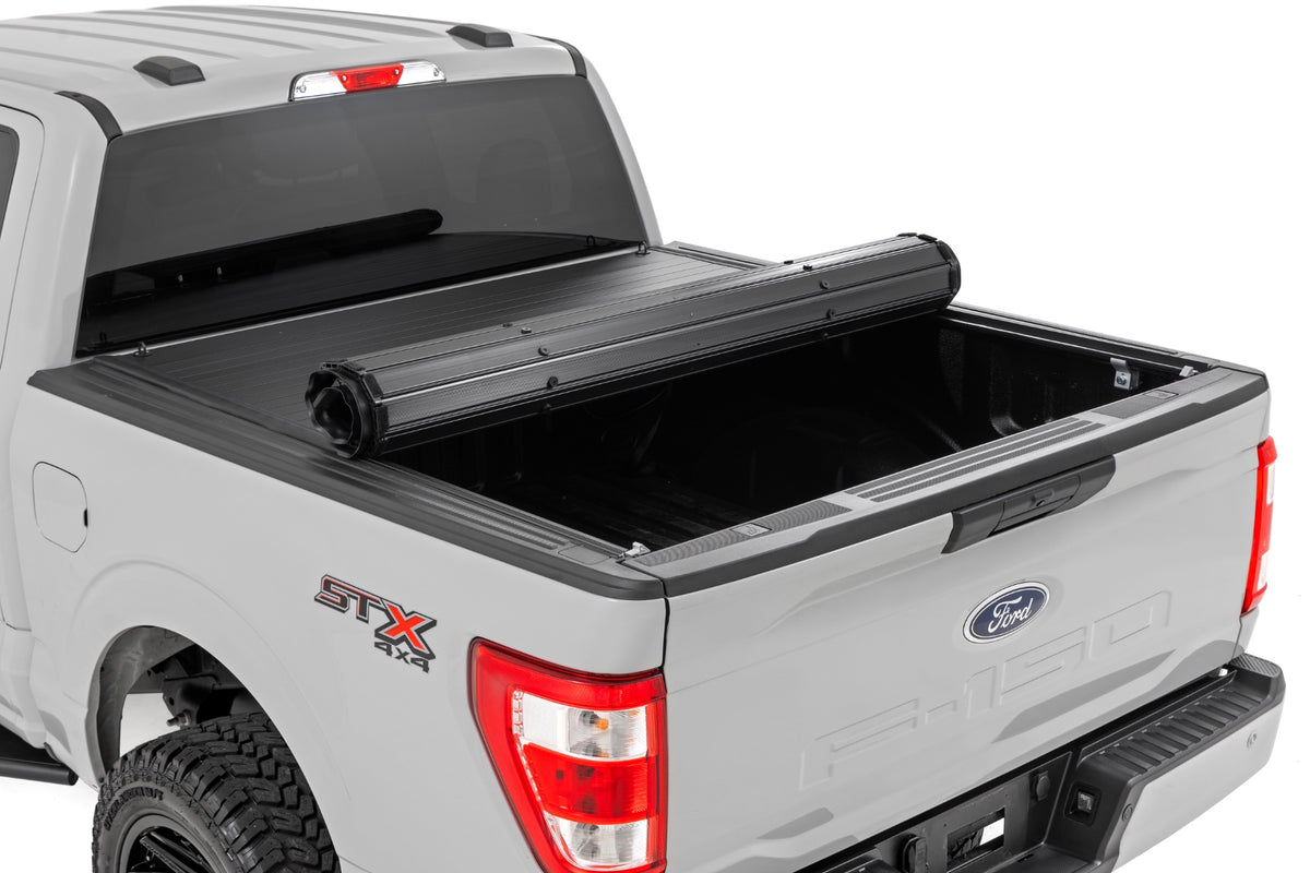 Rough Country 50221550 Hard Roll Up Bed Cover | 5'7" Bed | Ford F-150 (15-26)/F-150 Lightning (22-26) - Studio View 4