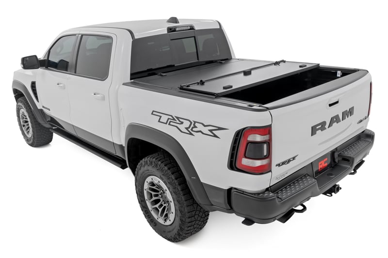 RC Hard Tri-Fold Flip Up Fold Bed Cover | 5'7" Bed | Ram 1500 (19-26)/1500 TRX (21-24) (manufacturer page)