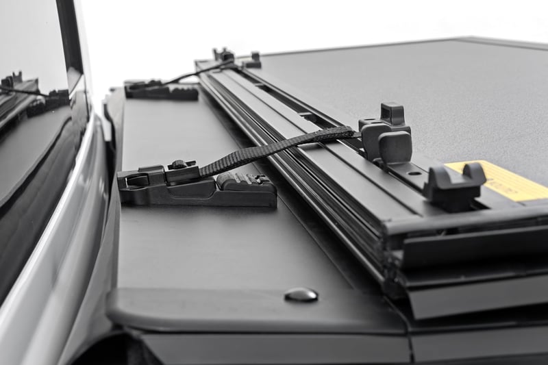 RC Hard Tri-Fold Flip Up Fold Bed Cover | 5'7" Bed | Ram 1500 (19-26)/1500 TRX (21-24) (manufacturer page)