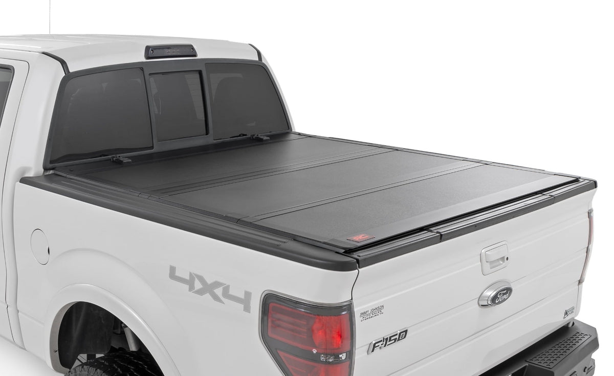 Hard Tri-Fold Flip Up Bed Cover | 5'7" Bed | Ford F-150 2WD/4WD (2004-2014) - Bed Covers (Image 1 of 6)