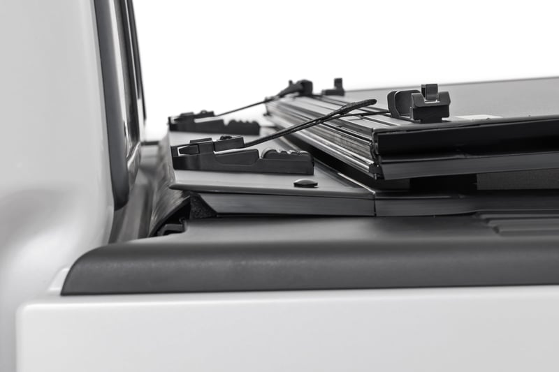 RC Hard Tri-Fold Flip Up Bed Cover | 5'7" Bed | Ford F-150 2WD/4WD (2004-2014) (manufacturer page)