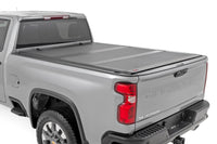 Hard Tri-Fold Flip Up Bed Cover | 6'9" Bed | Chevy/GMC  Silverado/Sierra 2500HD/3500HD (20-26) - Bed Covers (Image 1 of 6)