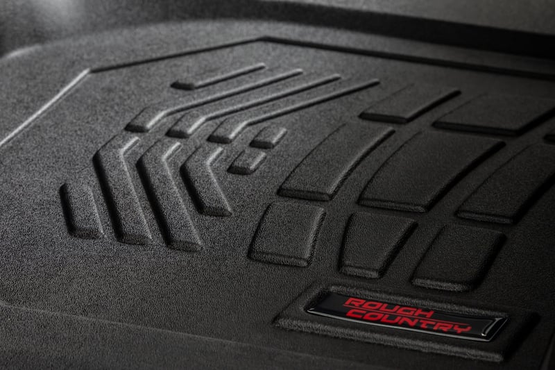 Sure-Fit Floor Mats | Front Over Hump | Crew | Chevy/GMC 1500/2500HD/3500HD (19-26) (manufacturer page)