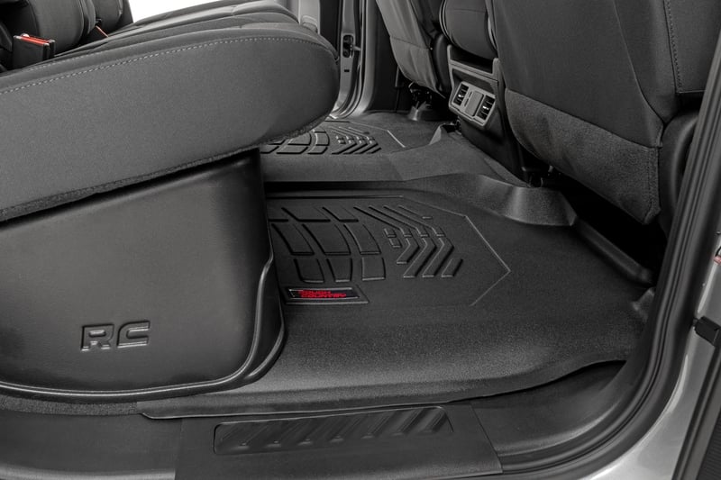 Sure-Fit Floor Mats | Front Over Hump | Crew | Chevy/GMC 1500/2500HD/3500HD (19-26) (manufacturer page)