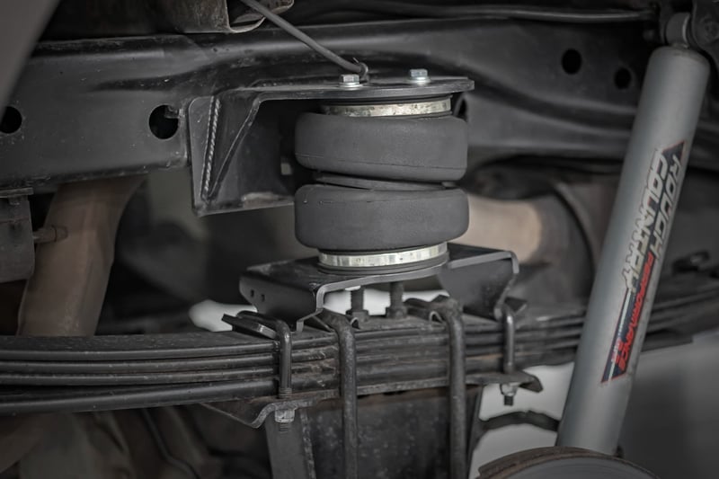 RC Air Spring Kit w/compressor | Wireless Controller | 0-6" Lifts | Ford F-150 (04-14) (manufacturer page)