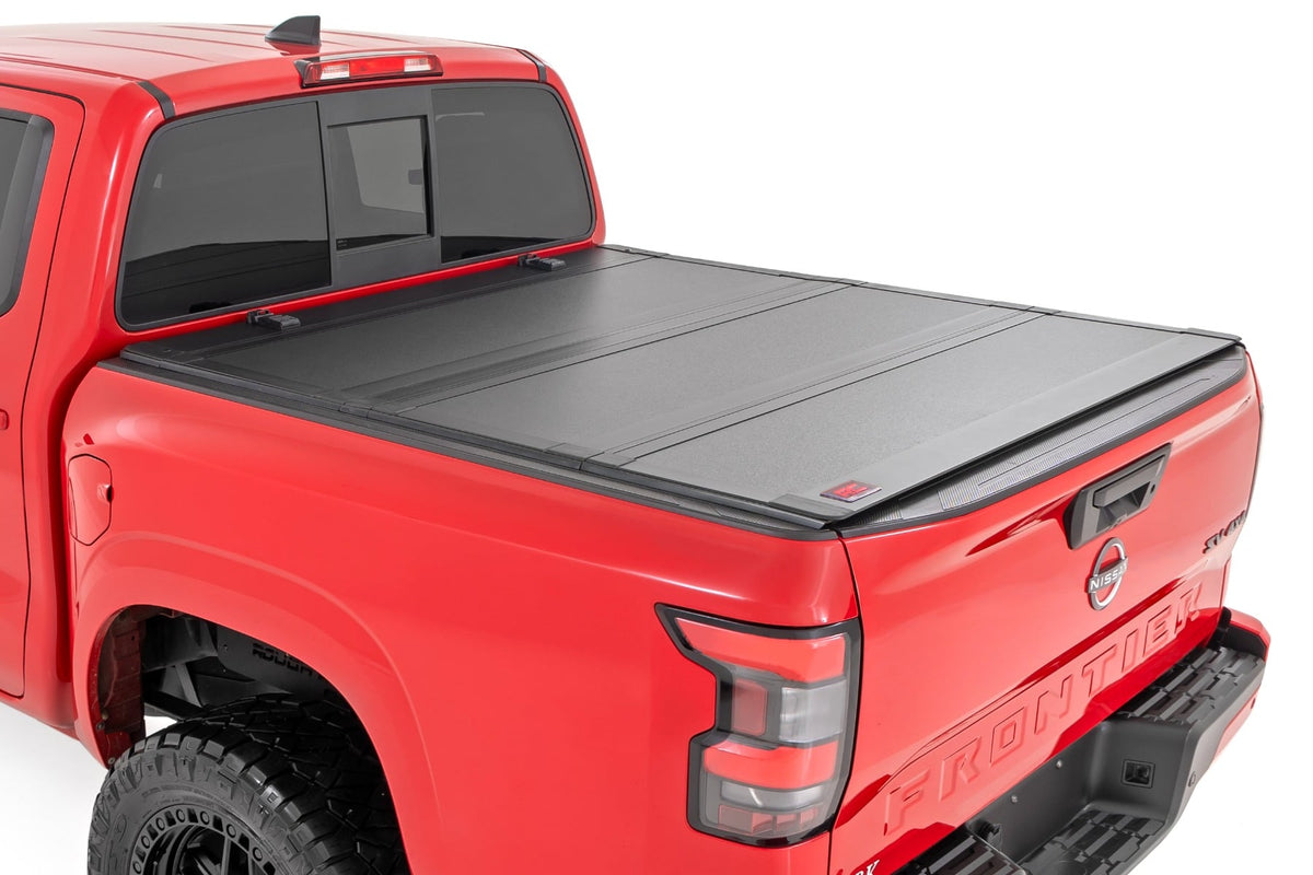 Hard Tri-Fold Flip Up Bed Cover | 5' Bed | Nissan Frontier 2WD/4WD (22-26) - Bed Covers (Image 1 of 6)