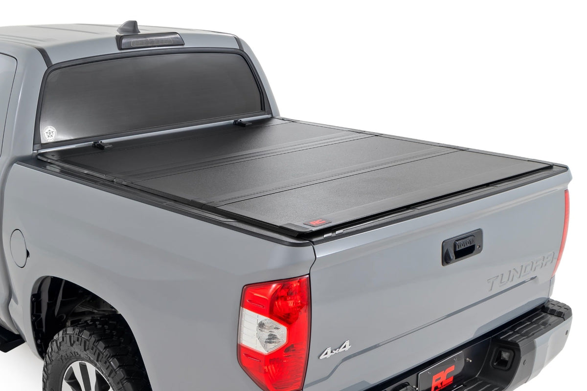 Hard Tri-Fold Flip Up Bed Cover | 5'7" Bed | Toyota Tundra 2WD/4WD (07-21) - Bed Covers (Image 1 of 6)
