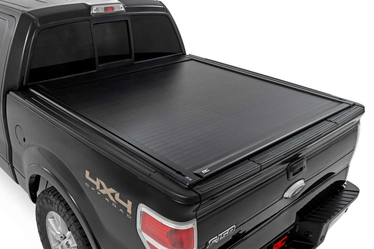 Powered Retractable Bed Cover | 5'7" Bed | Ford F-150 2WD/4WD (2009-2014) - Bed Covers (Image 1 of 6)