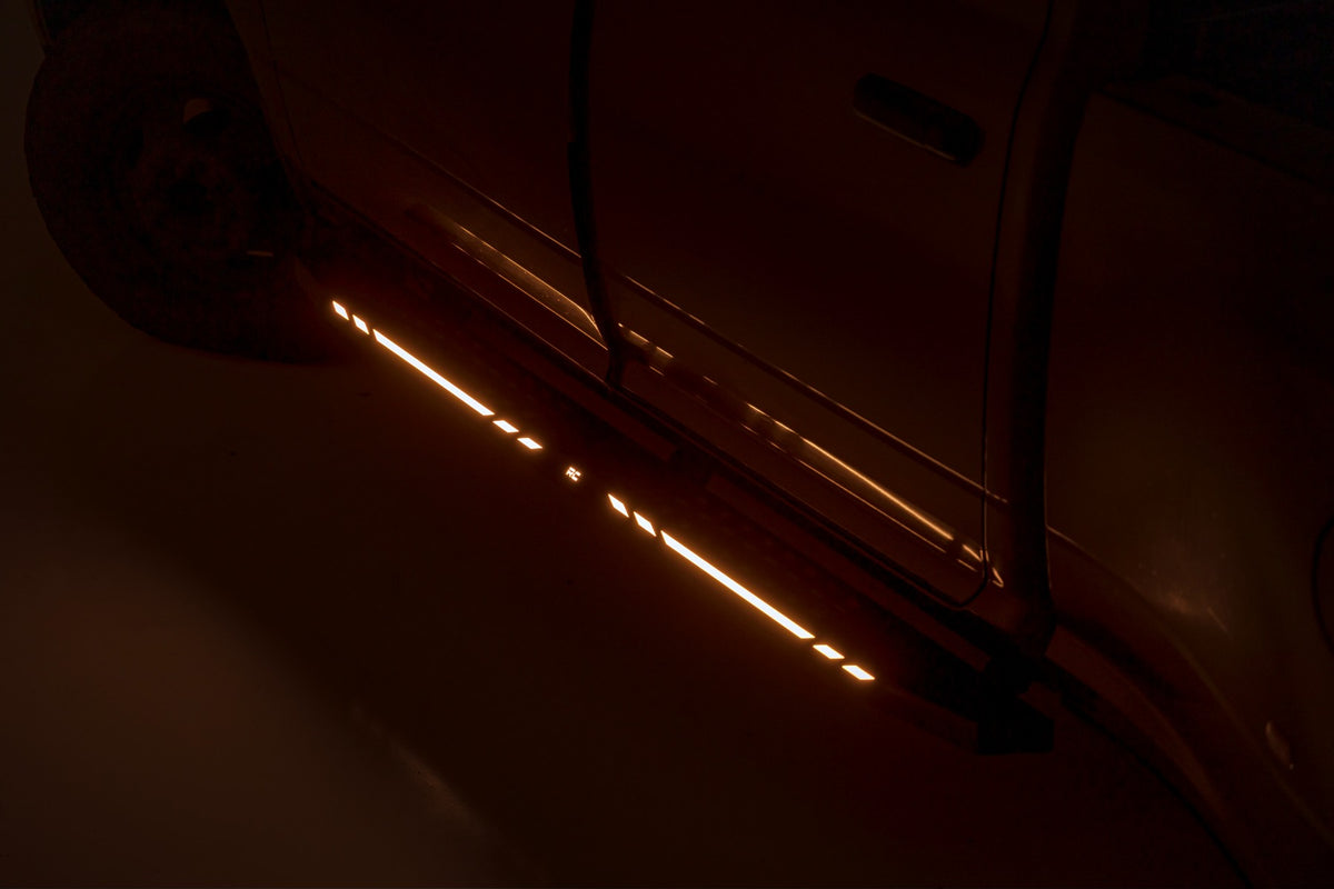 Rough Country 57009 AC2 Running Boards | Amber/White | Crew Cab | Ram 1500/2500/3500 2WD/4WD (2010-2025 & Classic) - Studio View 4