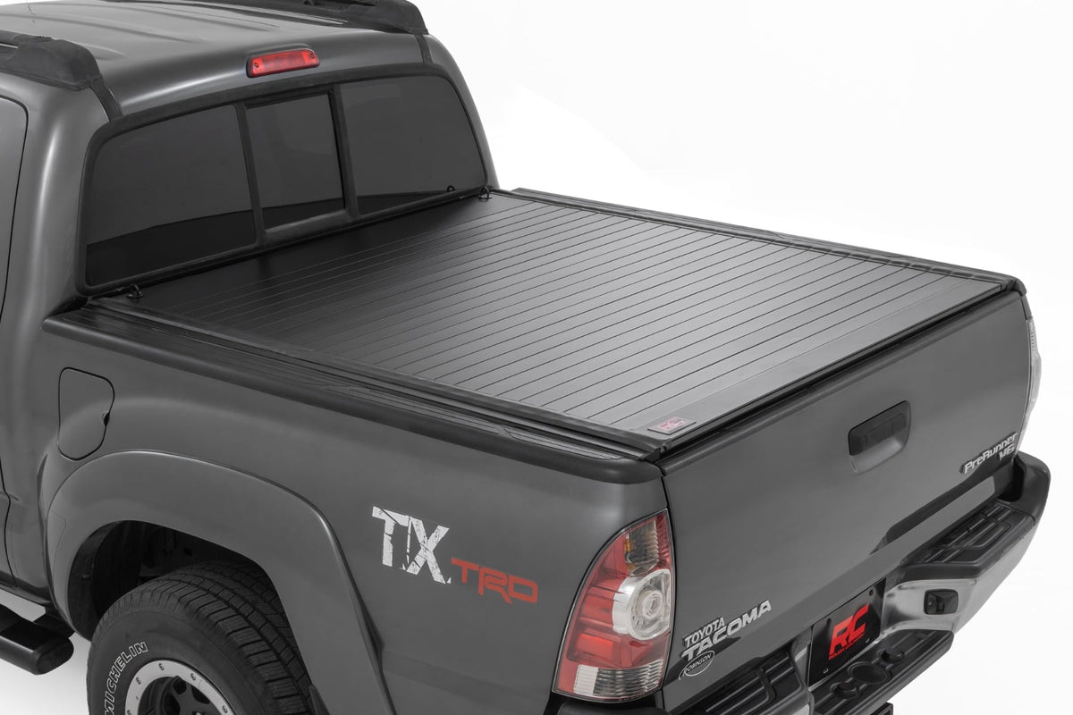 Rough Country 50415500 Hard Roll Up Bed Cover | 5' Bed | Toyota Tacoma 2WD/4WD (2005-2015) - Studio View 1