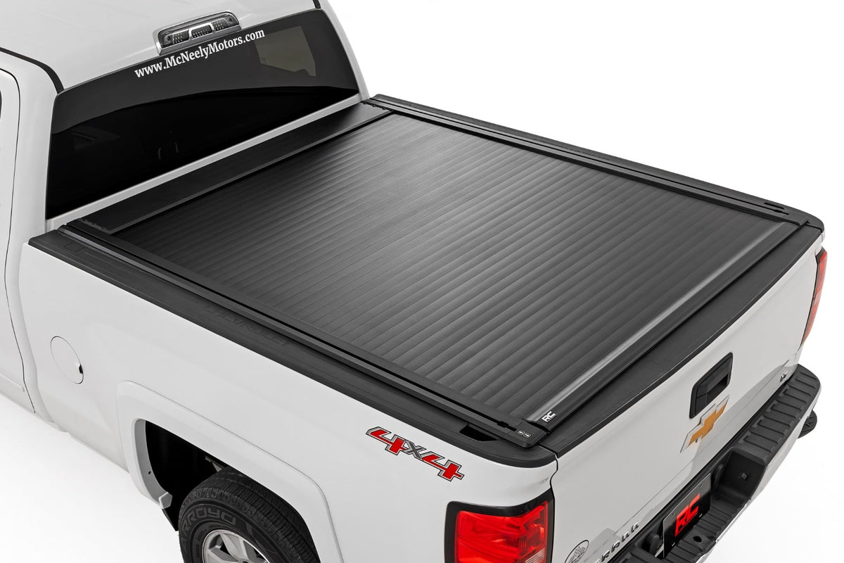 Rough Country 51129651 Powered Bed Cover | 6'7" Bed | Chevy/GMC 1500/2500HD/3500HD (14-19 & Classic) - Studio View 1