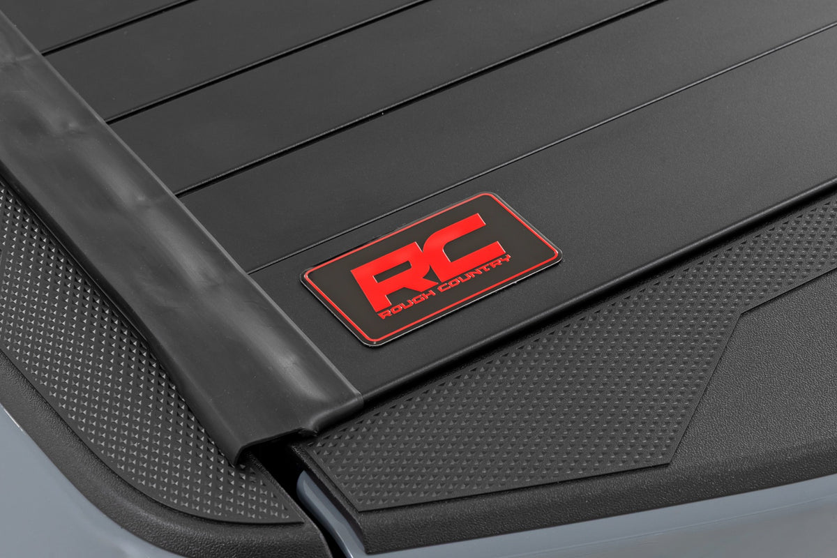 Rough Country 50215522 Hard Roll Up Bed Cover | 5' Bed | Nissan Frontier 2WD/4WD (2022-2026) - Studio View 6