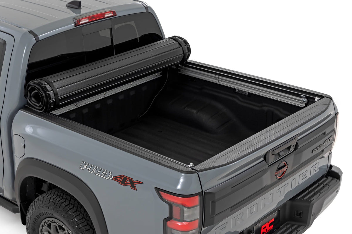 Rough Country 50215522 Hard Roll Up Bed Cover | 5' Bed | Nissan Frontier 2WD/4WD (2022-2026) - Studio View 2