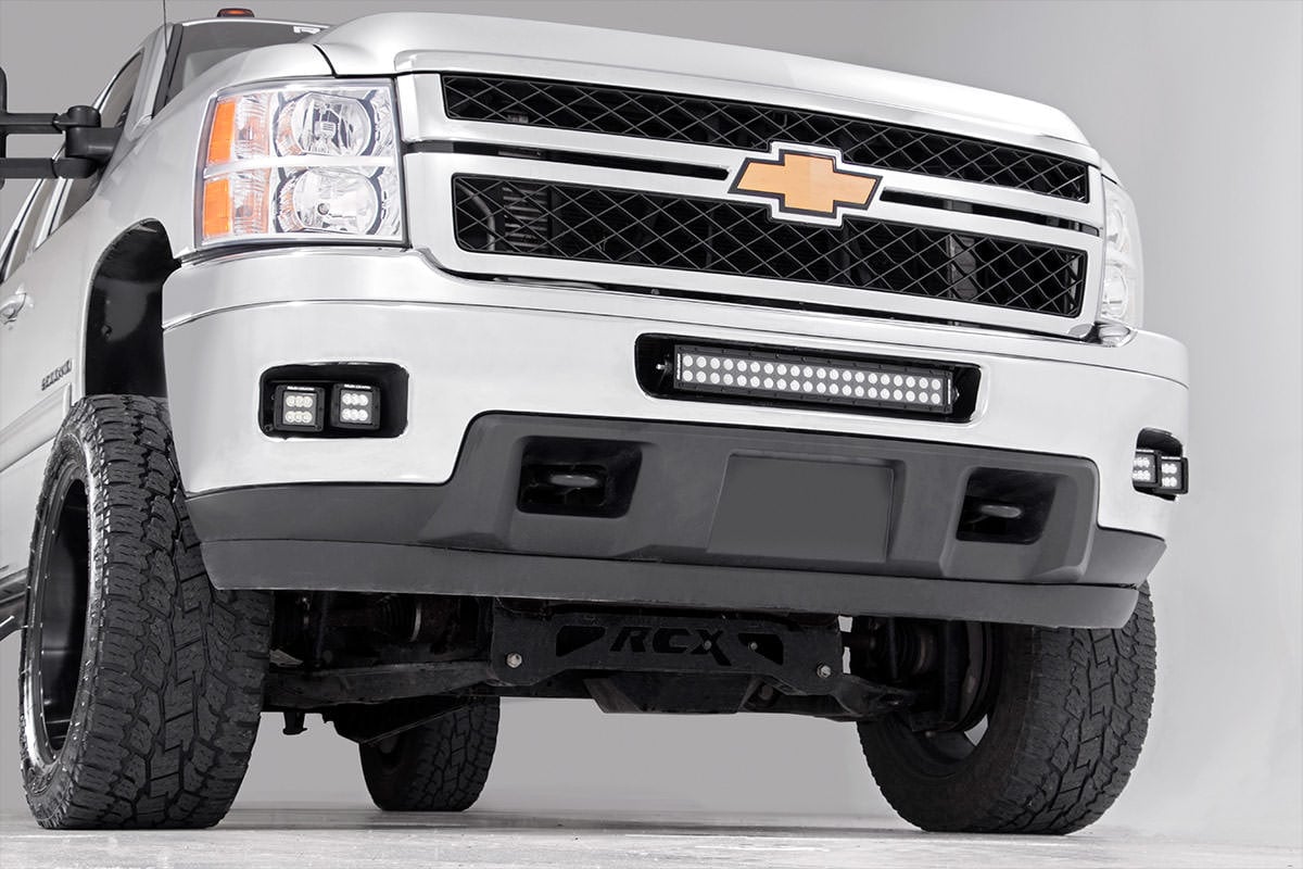 RC LED Light Kit | Fog Mount | 2" Black Pair | White DRL | Chevy Silverado 2500 HD/3500 HD (11-14) (manufacturer page)
