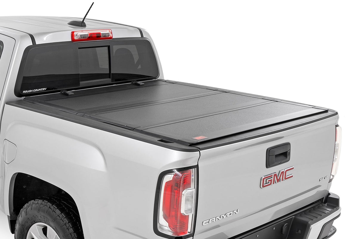 Hard Tri-Fold Flip Up Bed Cover | 5' Bed | Chevy/GMC Canyon/Colorado (15-26) - Bed Covers (Image 1 of 6)