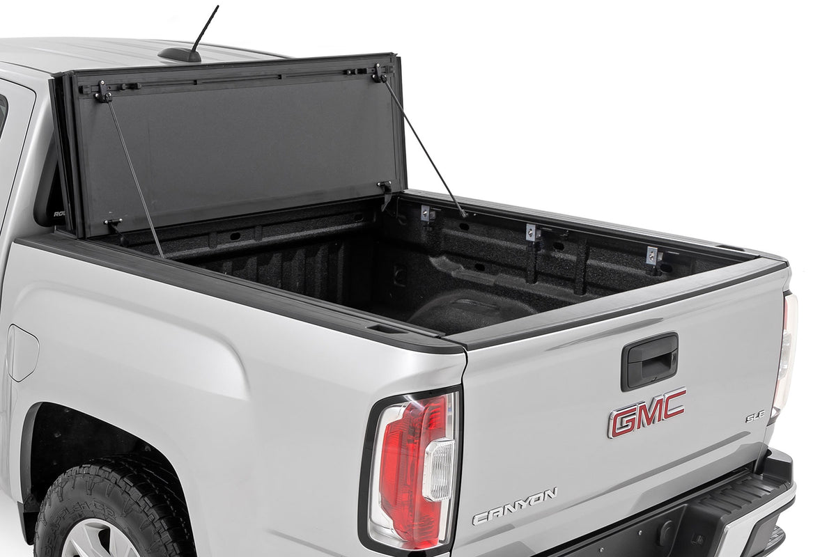 Hard Tri-Fold Flip Up Bed Cover | 5' Bed | Chevy/GMC Canyon/Colorado (15-26) - Bed Covers (Image 2 of 6)