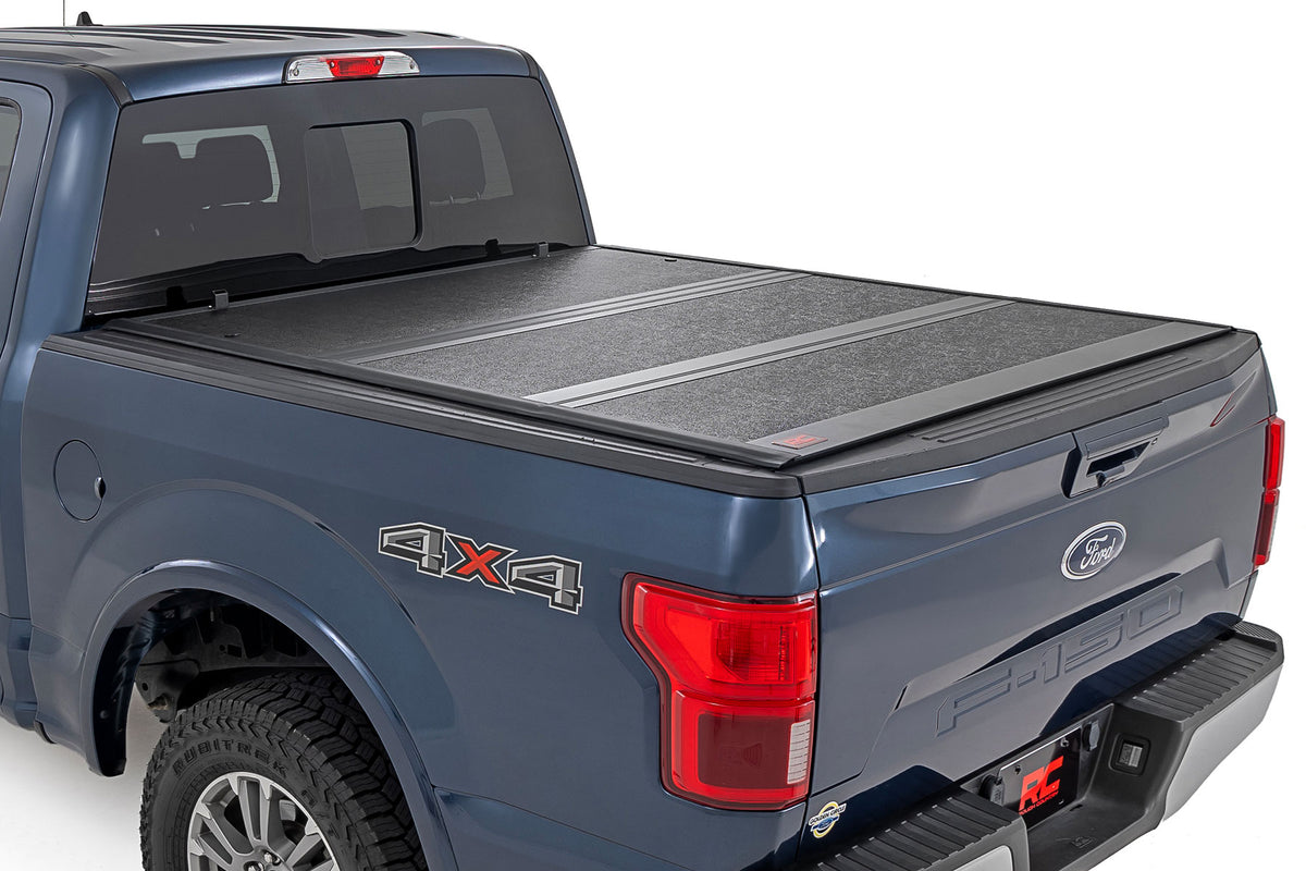 Rough Country 47221550B Hard Low Profile Bed Cover | 5'7" Bed | Ford F-150 (21-26)/F-150 Lightning (22-26) - Studio View 1