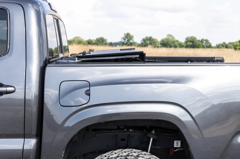 RC Hard Tri-Fold Flip Up Bed Cover | 5' Bed | Toyota Tacoma 2WD/4WD (2005-2015) (manufacturer page)