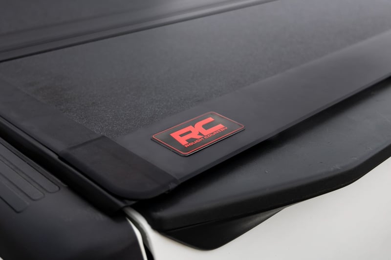 RC Hard Tri-Fold Flip Up Bed Cover | 5' Bed | Nissan Frontier 2WD/4WD (05-21) (manufacturer page)