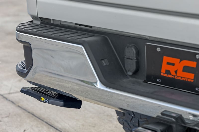 RC Retractable Bed Step | Manual Pull | Chevy/GMC 2500HD/3500HD (20-26) (manufacturer page)