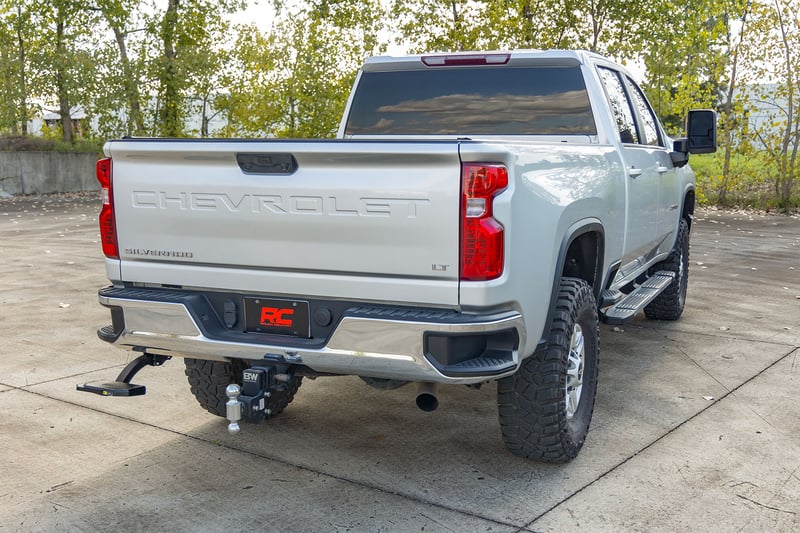 RC Retractable Bed Step | Manual Pull | Chevy/GMC 2500HD/3500HD (20-26) (manufacturer page)