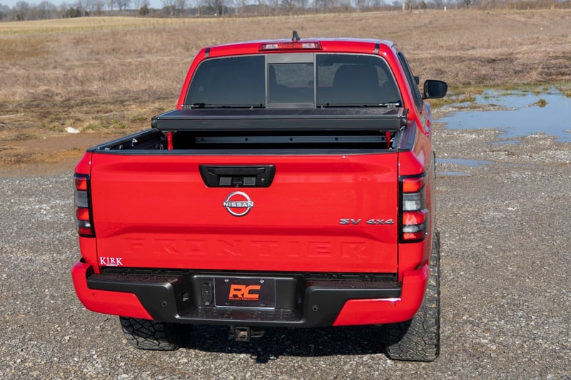 RC Hard Low Profile Bed Cover | 5' Bed | w/Cargo Mgmt | Nissan Frontier (22-26) (manufacturer page)