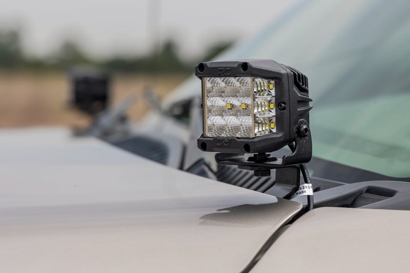 RC LED Light Kit | Ditch Mount | 2" Black Pair | Flood | Chevy Silverado 1500 (99-06)/Tahoe (00-06) (manufacturer page)