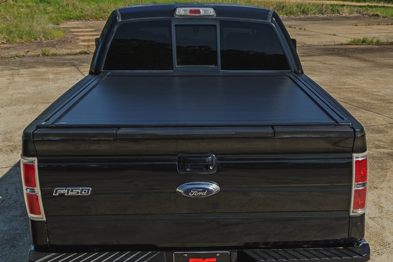 RC Powered Retractable Bed Cover | 5'7" Bed | Ford F-150 2WD/4WD (2009-2014) (manufacturer page)