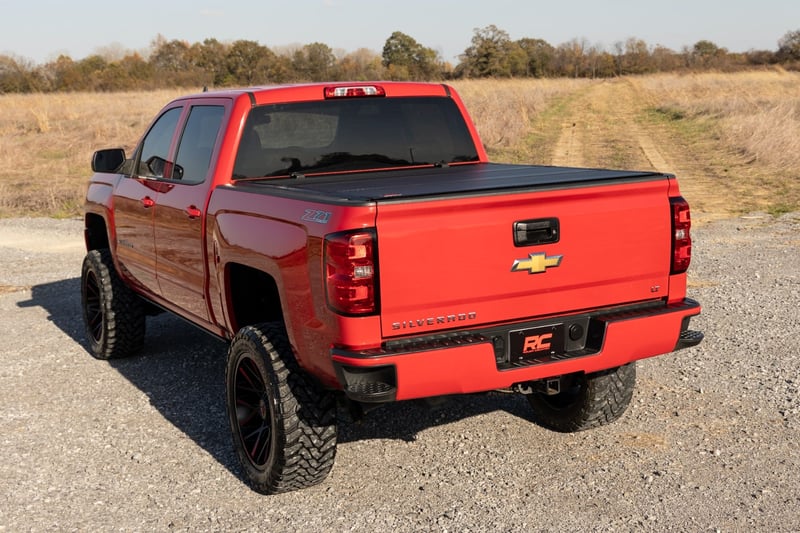 RC Hard Tri-Fold Flip Up Bed Cover | 6'7" Bed | Rail Cap | Chevy/GMC 1500/2500HD/3500HD (14-19) (manufacturer page)