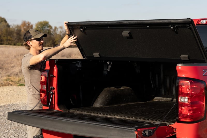 RC Hard Tri-Fold Flip Up Bed Cover | 6'7" Bed | Rail Cap | Chevy/GMC 1500/2500HD/3500HD (14-19) (manufacturer page)