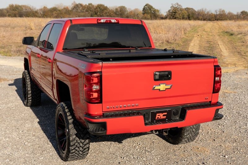 RC Hard Tri-Fold Flip Up Bed Cover | 6'7" Bed | Rail Cap | Chevy/GMC 1500/2500HD/3500HD (14-19) (manufacturer page)