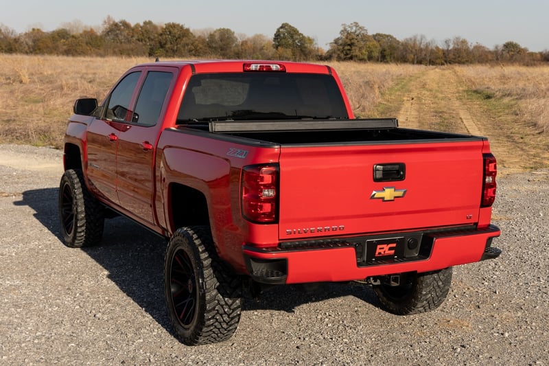 RC Hard Tri-Fold Flip Up Bed Cover | 6'7" Bed | Rail Cap | Chevy/GMC 1500/2500HD/3500HD (14-19) (manufacturer page)