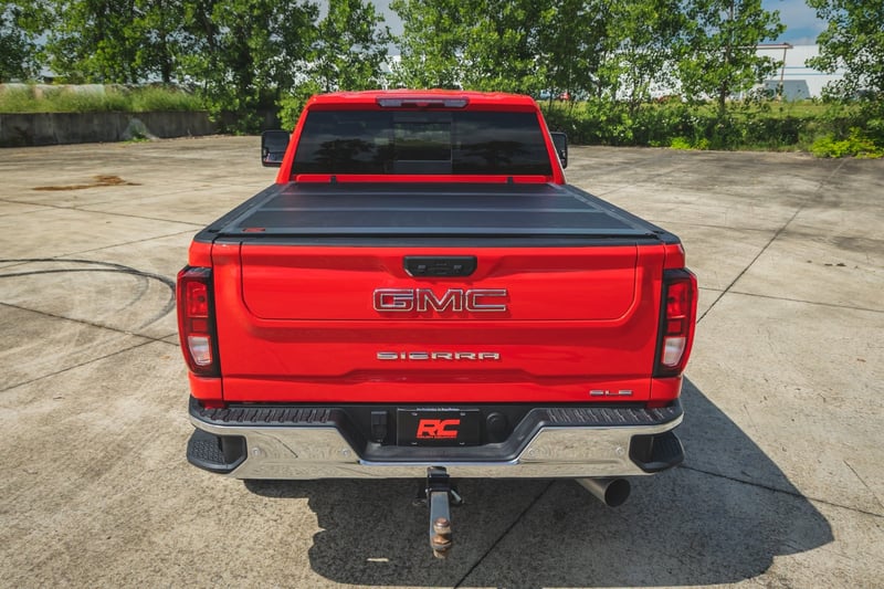 RC Hard Low Profile Bed Cover | 6'9" Bed | Rail Caps | Chevy/GMC 2500HD/3500HD (20-26) (manufacturer page)