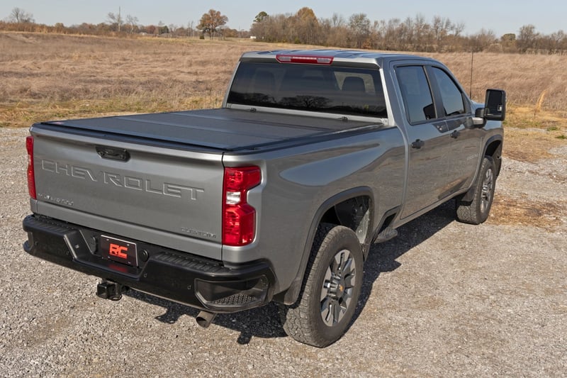 RC Hard Tri-Fold Flip Up Bed Cover | 6'9" Bed | Chevy/GMC Silverado/Sierra 2500HD/3500HD (20-26) (manufacturer page)