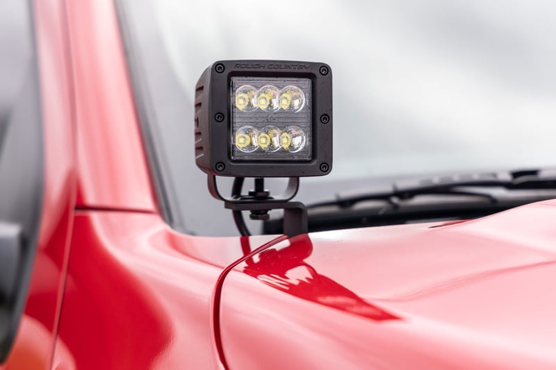 RC LED Light Kit | Ditch Mount | 2" Black Pair | Spot | Nissan Frontier (22-26) (manufacturer page)