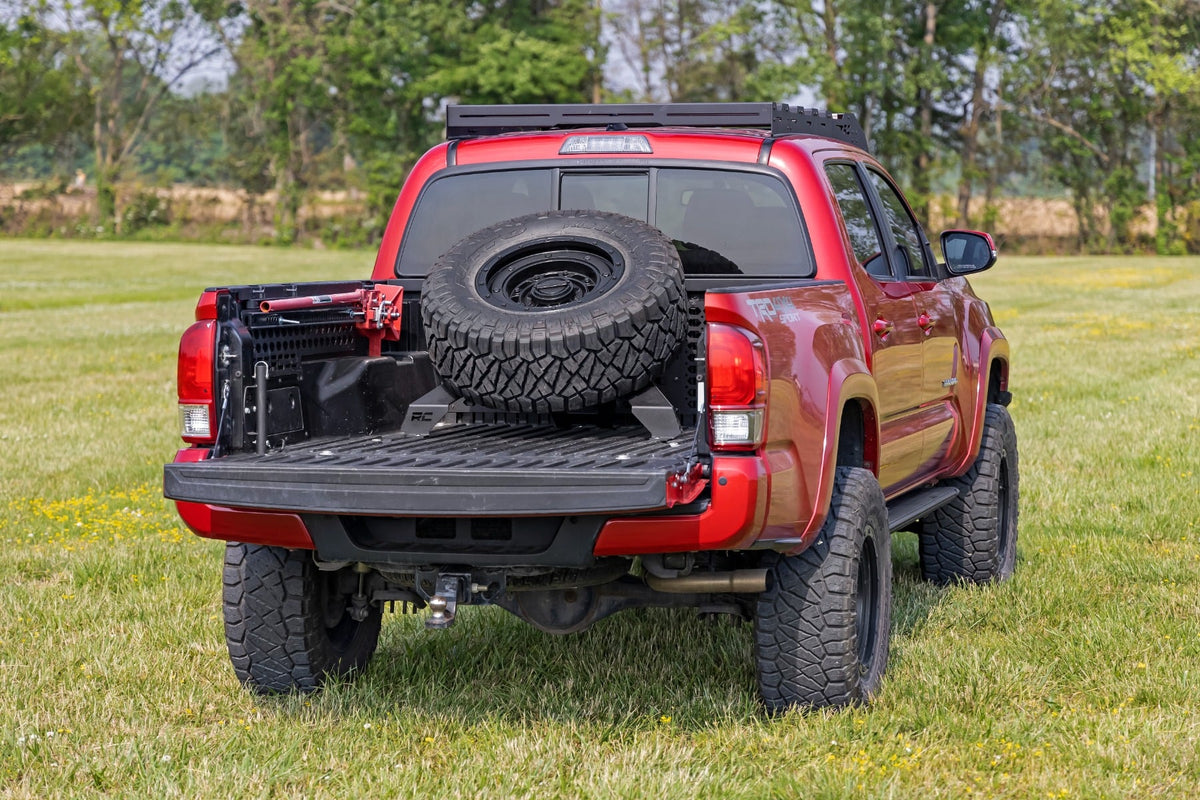 Bed Mount Spare Tire Carrier | Universal (5x5.5 6x5.5 6x135 & 5x5.0 Bolt Patterns) - Cargo Management (Image 5 of 6)