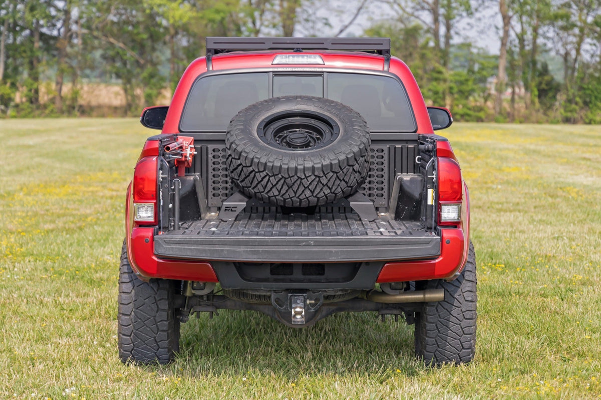 Bed Mount Spare Tire Carrier | Universal (5x5.5 6x5.5 6x135 & 5x5.0 Bolt Patterns) - Cargo Management (Image 6 of 6)