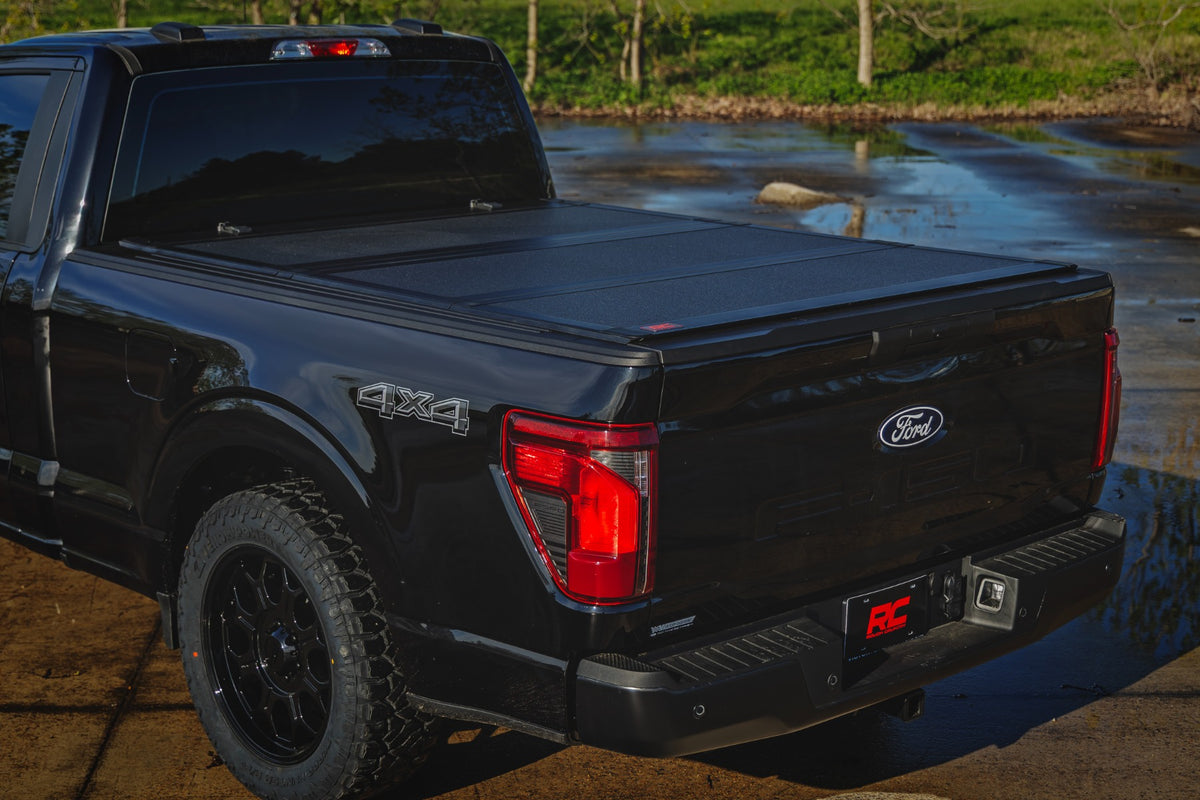 Rough Country 49225650 Hard Tri-Fold Flip Up Bed Cover | 6'7" Bed | Ford F-150 2WD/4WD (2021-2026) - Studio View 6