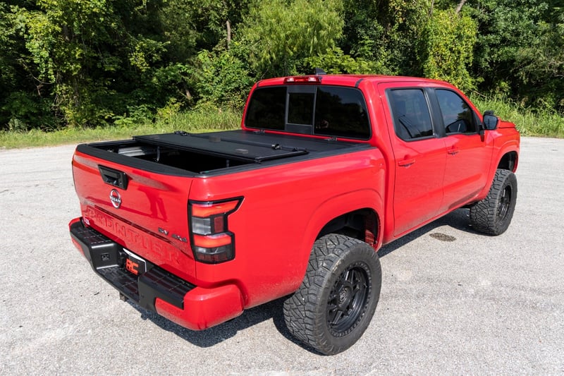 RC Hard Tri-Fold Flip Up Bed Cover | 5' Bed | Nissan Frontier 2WD/4WD (22-26) (manufacturer page)