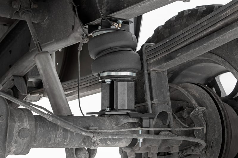 RC Air Spring Kit w/compressor | Wireless Controller | 0-6" Lift | Chevy/GMC 2500HD (01-10) (manufacturer page)
