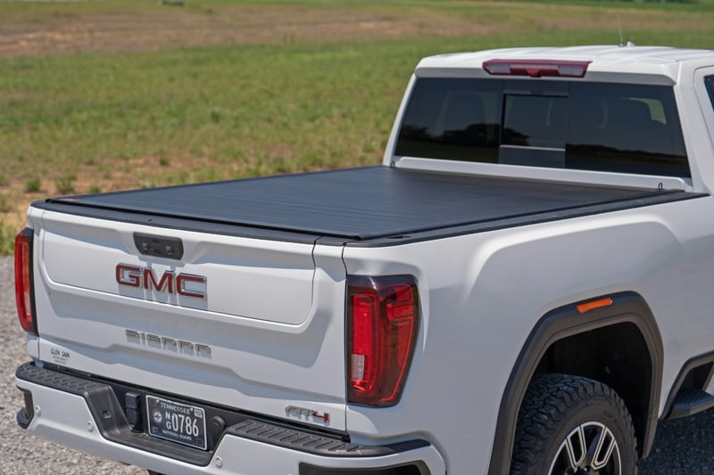 RC Hard Roll Up Bed Cover | 6'9" Bed | Chevy/GMC Silverado/Sierra 2500HD/3500HD (20-26) (manufacturer page)