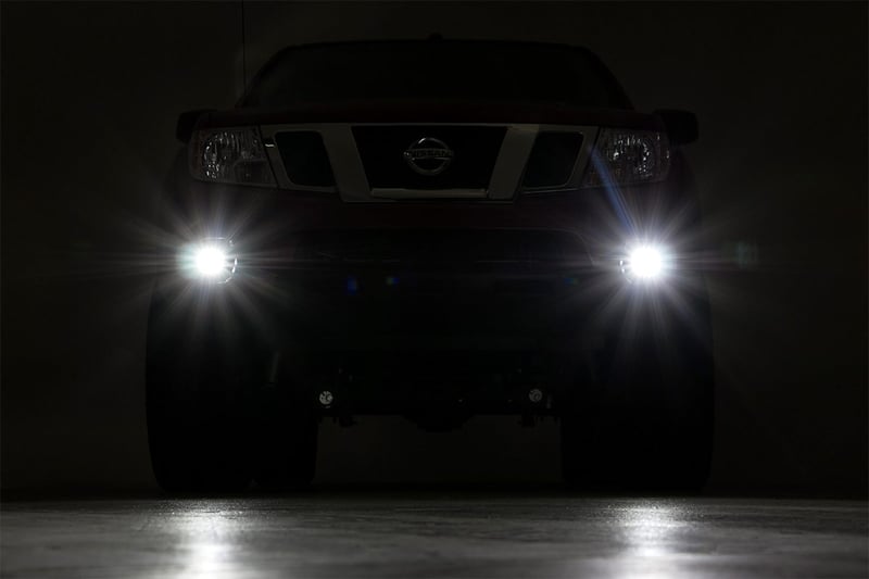 RC LED Light Kit | Fog Mount | 2" Black Pair | Spot | Nissan Frontier (05-20) (manufacturer page)