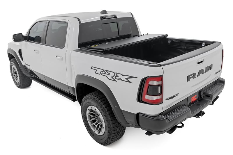 RC Hard Tri-Fold Flip Up Fold Bed Cover | 5'7" Bed | Ram 1500 (19-26)/1500 TRX (21-24) (manufacturer page)